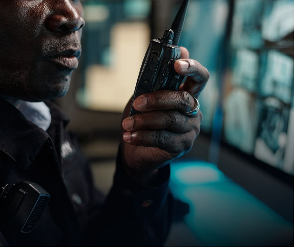Control room operator monitoring CCTV feeds